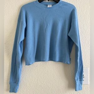 TNA ribbed cropped long sleeve top. Only worn once! Very comfortable